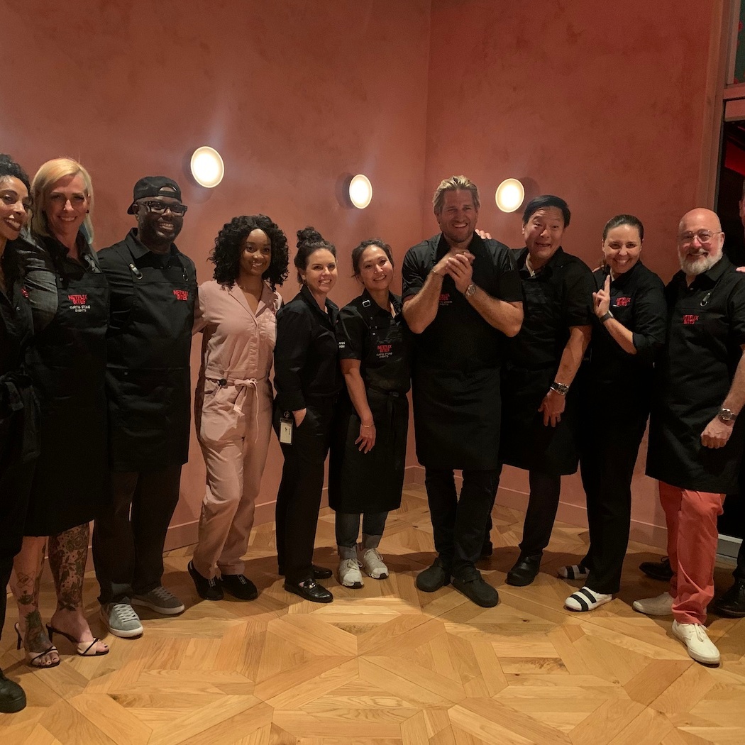 Netflix Bites chefs stand in a row and pose for picture.
